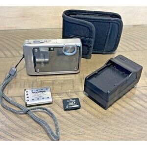 Olympus Stylus 770 SW Silver 7.1MP Digital Camera WORKS Battery Charger SIM CASE